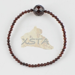 Amber bracelet with round faceted beads